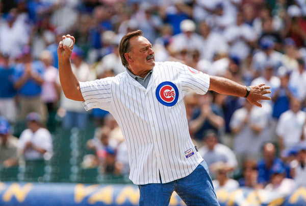 Dick Butkus throws out the first pitch before a Cubs-Giants game at Wrigley Field. Bonnie Trafelet / Chicago Tribune