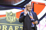 Dick Butkus acknowledges fans before announcing the second-round draft pick for the Chicago Bears during the 2015 NFL Draft at the Auditorium Theatre at Roosevelt University, May 1, 2015, in Chicago. John J. Kim / Chicago Tribune