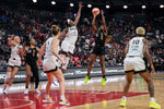 Las Vegas Aces guard Jackie Young (0) shoots against Chicago Sky center Elizabeth Williams (1) during the first half of Game 1 at T-Mobile Arena on Sept. 13, 2023, in Las Vegas. Ellen Schmidt / Las Vegas Review-Journal