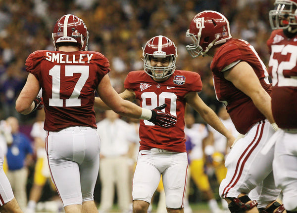 Alabama kicker Jeremy Shelley (90) celebrates with Alabama tight end Brad Smelley (17) after a field goal in the third quarter. Shelley made five of his seven attempts, the most in a BCS Championship Game.