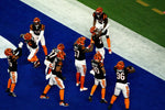 Cincinnati Bengals cornerback Chidobe Awuzie (22) celebrates with other defenders after intercepting a pass in the second half during Super Bowl 56, Feb. 13, 2022. Albert Cesare/The Enquirer