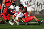 Cincinnati Bearcats linebacker Deshawn Pace (20) tackles Tulsa Golden Hurricane safety Brad Hensley (18) on a punt return in the second quarter during an NCAA football game, Saturday, Nov. 6, 2021, at Nippert Stadium in Cincinnati. The Enquirer