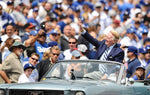 Vin Scully is used to waving to fans, here at Dodger Stadium. When he was grand marshal of the Rose Parade he said: “And the one thing I tried to do, and I did it until, really, my shoulders were sore, I wasn’t just waving — I was applauding a lot. I kept applauding and gesturing to the people, ‘I’m applauding you. I’m thanking you for all the years,’ and they’ve been so good and kind and generous to me.” WALLY SKALIJ / LOS ANGELES TIMES