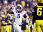 TCU linebacker Jamoi Hodge reacts after a stoppage during their game against Michigan at the Vrbo Fiesta Bowl in Glendale, Ariz., on Dec. 31, 2022. (Amanda McCoy / Fort Worth Star-Telegram)