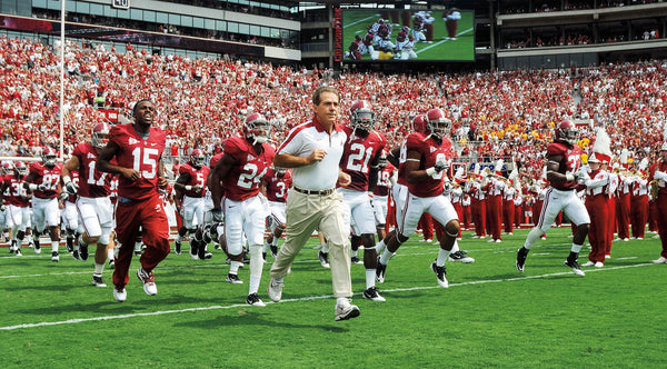 Alabama coach Nick Saban leads his team onto the field for the first game of the 2011 season on Saturday September 3, 2011 against Kent State.