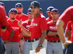 Head coach Andy Lopez, center, talks with his team before UA baseball practice on March 7, 2013, at Hi Corbett Field in Tucson. Courtesy Mike Christy / Arizona Daily Star