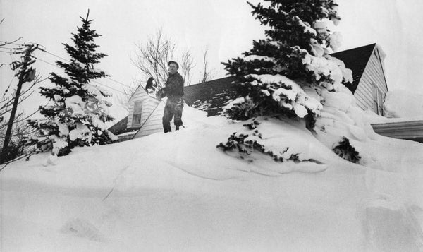 Edward Domanowski faces the daunting task of shoveling the huge snow drift away from the front of his home at 220 Pleasantview Road in Lancaster. Courtesy Ron Schifferle photo, The Courier-Express Photograph Collection. Archives & Special Collections Department, E. H. Butler Library, SUNY Buffalo State