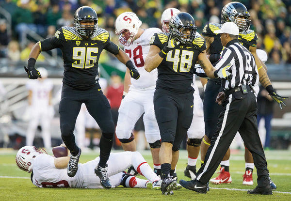 Oregon linebackers French (96) and Hardrick (48) brought the pain to Stanford’s Kevin Hogan. Thomas Boyd/The Oregonian/OregonLive