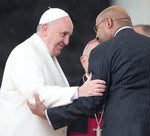 Philadelphia Mayor Michael Nutter, right, and Pope Francis, left, embrace during the Papal Audience in St. Peter's Square on March 26, 2014. David Maialetti / Staff Photographer