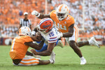 Tennessee defensive back Trevon Flowers (1) and Tennessee linebacker Elijah Herring (44) tackle Florida quarterback Anthony Richardson (15) during the second half of a game between the Tennessee Vols and Florida Gators, in Neyland Stadium, Sept. 24, 2022. Tennessee defeated Florida 38-33. (Caitie McMekin/News Sentinel)