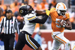 Tennessee quarterback Hendon Hooker (5) tries to hold back Missouri defensive lineman Tyrone Hopper II (5) during an NCAA college football game on Saturday, November 12, 2022 in Knoxville, Tenn. (Saul Young/News Sentinel)