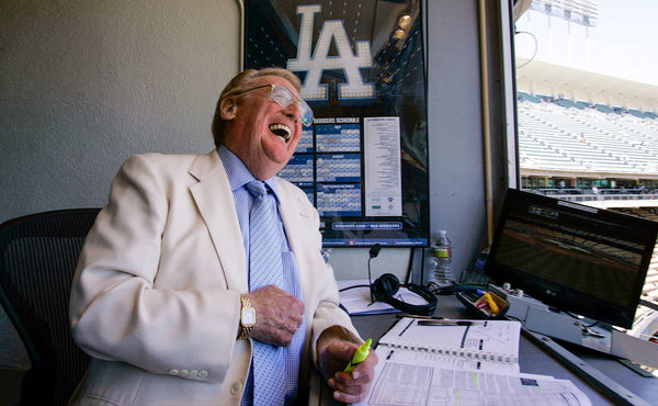Vin Scully was always in on the joke, he simply got it. Regardless of it was a name game with a sportswriter or a joke that elicited a true belly laugh, Scully enjoyed what he did. Here, in 2009, he was more than amused at someone’s comment after saying he was returning for a 62nd year.  GARY FRIEDMAN / LOS ANGELES TIMES