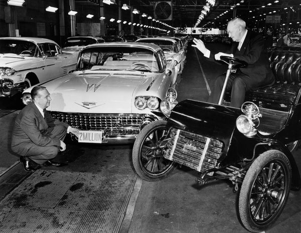 Two old friends, retiree Joe Malachinski (right) who started his 52½ years service at Cadillac in 1903 and Cadillac General Manager James M. Roche, dropped in at the Cadillac factory in Detroit February 7, 1958, to help celebrate the achievement of a significant milestone — production of the 2,000,000th Cadillac. Courtesy Detroit Public Library / #na030084
