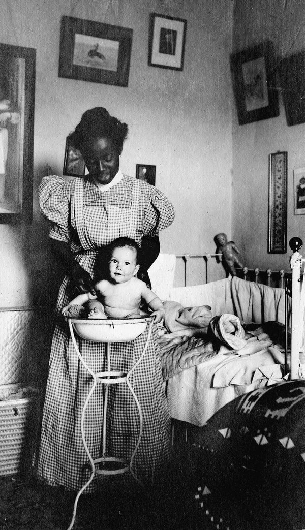 A woman bathing an infant, circa 1915. Courtesy Ferron-Bracken Photo Collection, UNLV University Libraries Special Collections & Archives