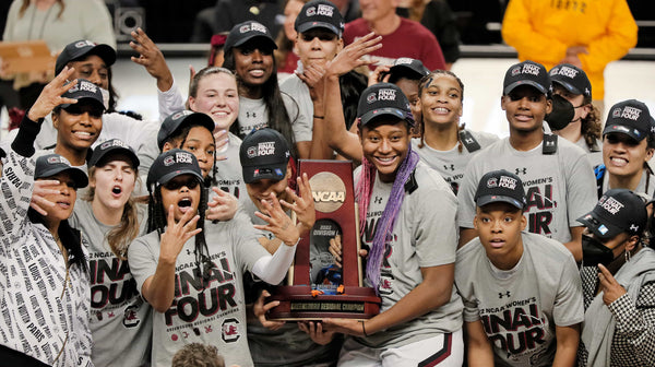 South Carolina celebrates an Elite Eight victory and the NCAA regional championship at the Greensboro Coliseum, March 27, 2022. Dwayne McLemore / The State