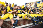 Michigan enjoyed a beautiful start to its 144th season — a sunny Saturday approaching 80 degrees — and a perfect finish to its opener — a 30-3 wipeout of East Carolina. Celebrating with their fans were redshirt sophomore tight end Max Bredeson (No. 44), who started; redshirt freshman edge Joey Klunder (No. 93), who made his U-M debut; and fifth-year senior offensive lineman Trente Jones (No. 53), who started as a sixth lineman. JUNFU HAN/DETROIT FREE PRESS
