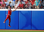 Oklahoma’s Jayda Coleman (24) makes a catch in the first inning during the second game of the championship series, June 9, 2022. SARAH PHIPPS / THE OKLAHOMAN