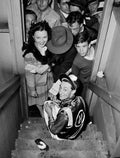 Jockey Eddie Arcaro is all smiles while signing autographs for fans after winning the 71st Kentucky Derby aboard Hoop Jr., June 9, 1945. It was Arcaro’s third Derby win. DICK FERGUSON