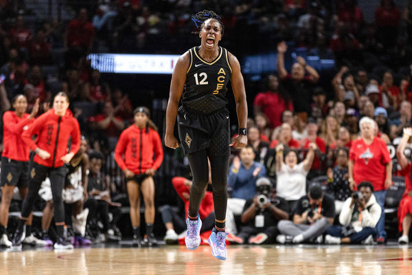 Las Vegas Aces guard Chelsea Gray (12) celebrates after scoring against the New York Liberty at Michelob ULTRA Arena, Aug. 17, 2023, in Las Vegas. Ellen Schmidt / Las Vegas Review-Journal