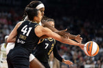 Las Vegas Aces center Kiah Stokes (41) steals the ball from Dallas Wings center Kalani Brown (21) during Game 1 of the semifinal series at Michelob ULTRA Arena, Sept. 24, 2023, in Las Vegas. Ellen Schmidt / Las Vegas Review-Journal