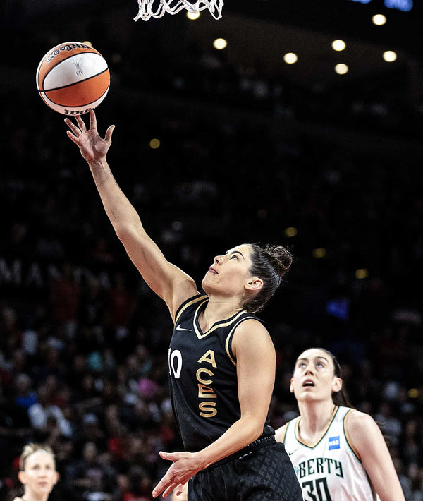 Las Vegas Aces guard Kelsey Plum (10) shoots while New York Liberty forward Breanna Stewart (30) looks on during the first half in Game 1 of the WNBA Final at Michelob ULTRA Arena, Oct. 8, 2023, in Las Vegas. Ellen Schmidt / Las Vegas Review-Journal