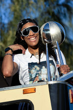 A'ja Wilson is all smiles with the Aces' championship trophy. Ellen Schmidt / Las Vegas Review-Journal