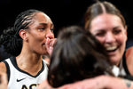 Las Vegas Aces forward A'ja Wilson, left, takes in the moment after Game 4 of the WNBA Final series against the New York Liberty at Barclays Center, Oct. 18, 2023, in Brooklyn, N.Y. Ellen Schmidt / Las Vegas Review-Journal