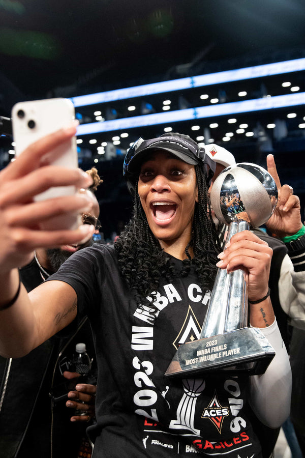 Las Vegas Aces forward A'ja Wilson poses for a selfie with her Most Valuable Player trophy after the Aces defeated the New York Liberty. Ellen Schmidt / Las Vegas Review-Journal