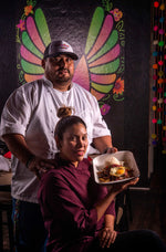 Giancarlo Zapata and Marleny Chávez of Chicha Peruvian Kitchen. They hold a plate of Lomo Saltado, a beef tender loin with stir-fried onions, tomatoes and soy sauce, served over garlic rice and french fries with a fried egg on top. HECTOR AMEZCUA / THE SACRAMENTO BEE