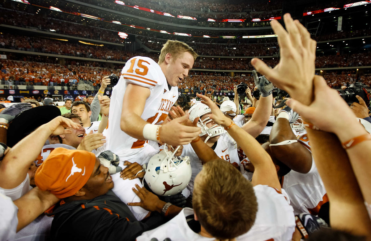 Texas kicker Hunter Lawrence (15) celebrates with his team after his 46-yard game-winning field goal in a 12-13 victory over Nebraska at the Big 12 Championship game on Dec. 5, 2009. Ricardo B. Brazziell / Austin American-Statesman