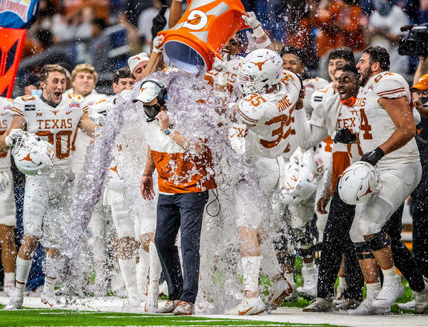 Texas Longhorns head coach Tom Herman is doused with Gatorade after beating the Colorado Buffaloes 55-23 during a game at the Valero Alamo Bowl at the Alamodome on Dec. 29, 2020, in San Antonio, Texas. Ricardo B. Brazziell / Austin American-Statesman
