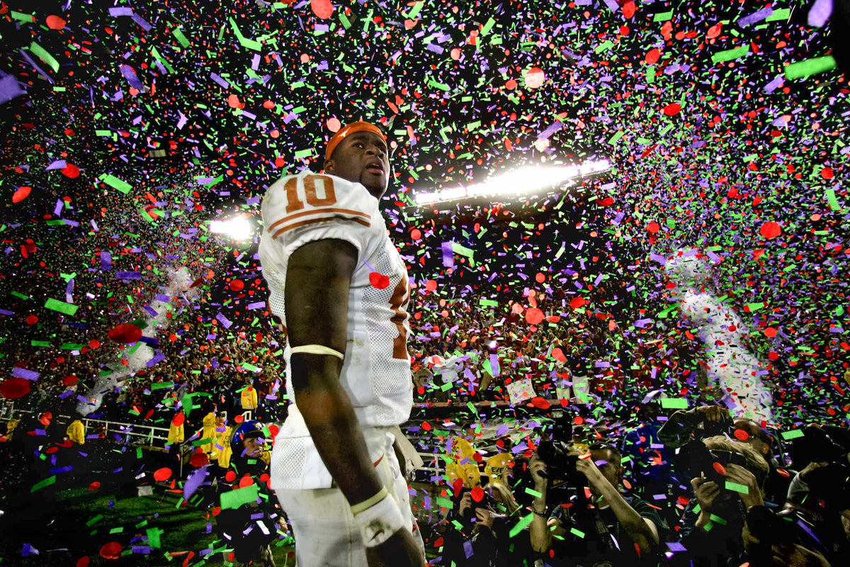 Quarterback Vince Young stands amid confetti following the Longhorns’ 41-38 victory over the University of Southern California during the 2006 Rose Bowl National Championship Game held in Pasadena, Calif, on Jan. 4, 2006. Rodolfo Gonzalez / Austin American-Statesman