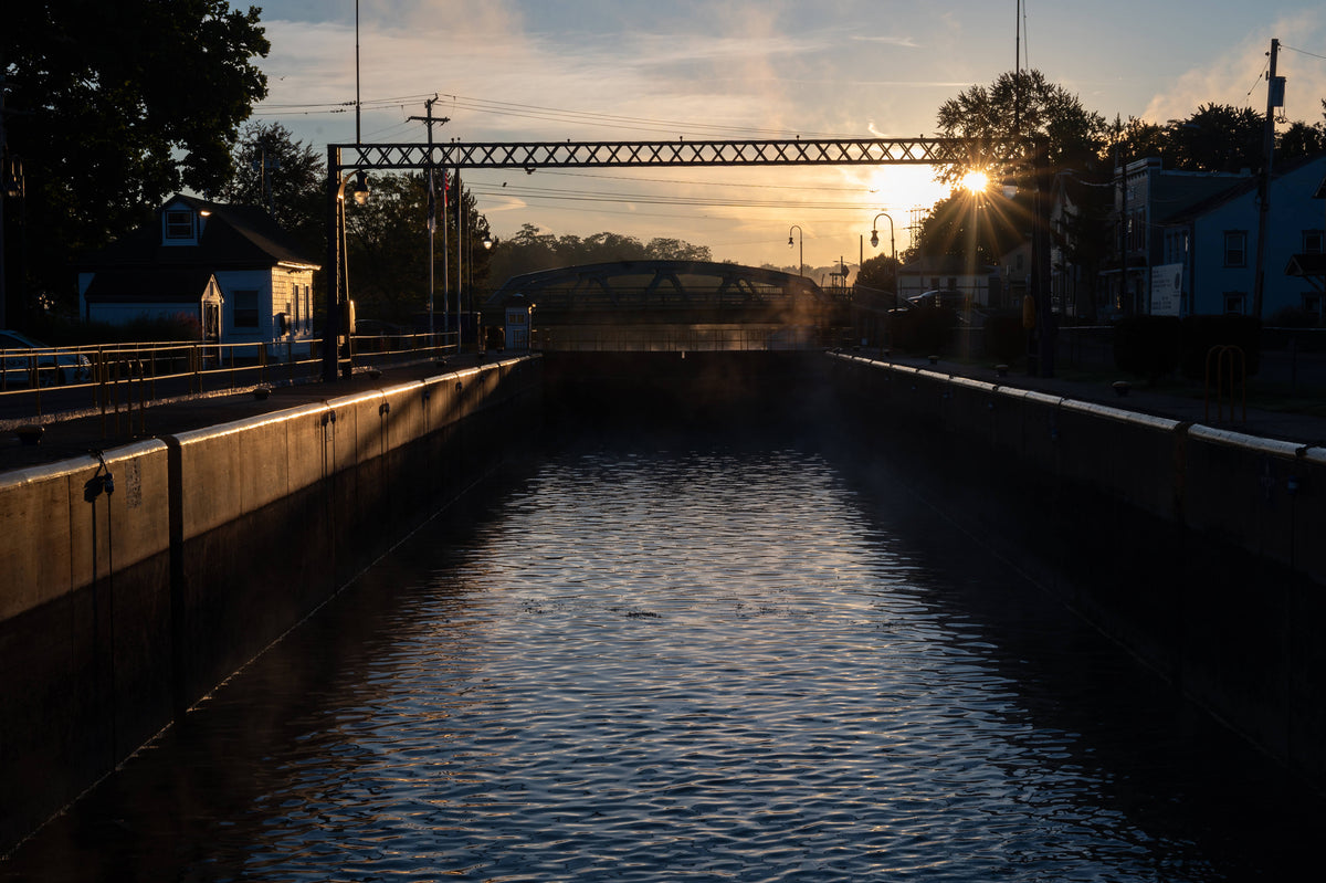 The sun rises over Lock E-24 of the New York State Barge Canal system in Baldwinsville. Surya Vaidy / Syracuse University