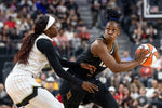 Las Vegas Aces guard Chelsea Gray (12) looks to pass while Chicago Sky guard Kahleah Copper (2) defends at T-Mobile Arena on Sept. 13, 2023, in Las Vegas. Ellen Schmidt / Las Vegas Review-Journal