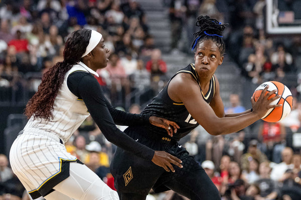 Las Vegas Aces guard Chelsea Gray (12) looks to pass while Chicago Sky guard Kahleah Copper (2) defends at T-Mobile Arena on Sept. 13, 2023, in Las Vegas. Ellen Schmidt / Las Vegas Review-Journal