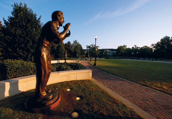 A statue of Nick Saban stands along side the Walk of Champions at Bryant-Denny Stadium. Butch Dill / USA TODAY Sports