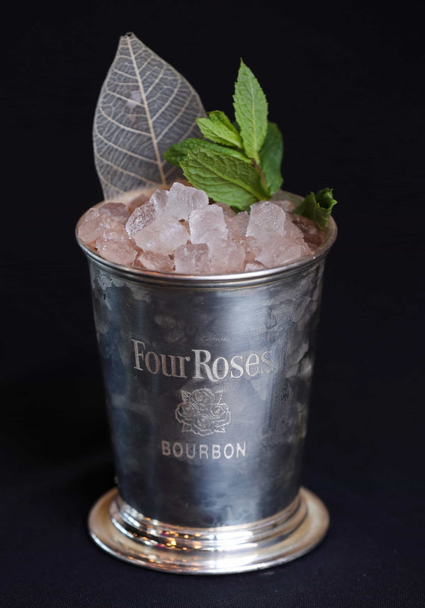 Katie Sherman created "Grandpa's Pocket Square" during the Four Roses Bourbon Rose Julep Contest at the Mellwood Arts Center in Louisville, Ky. on Mar. 5, 2020.  The concoctions are their interpretations of the famous Mint Julep made with Four Roses Bourbon. Sam Upshaw Jr. / The Courier Journal