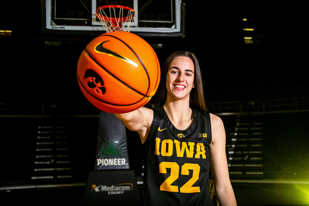 Iowa guard Caitlin Clark (22) poses for a photo during Hawkeyes NCAA college women's basketball media day, Oct. 28, 2021, at Carver-Hawkeye Arena in Iowa City, Iowa.  Joseph Cress / Des Moines Register