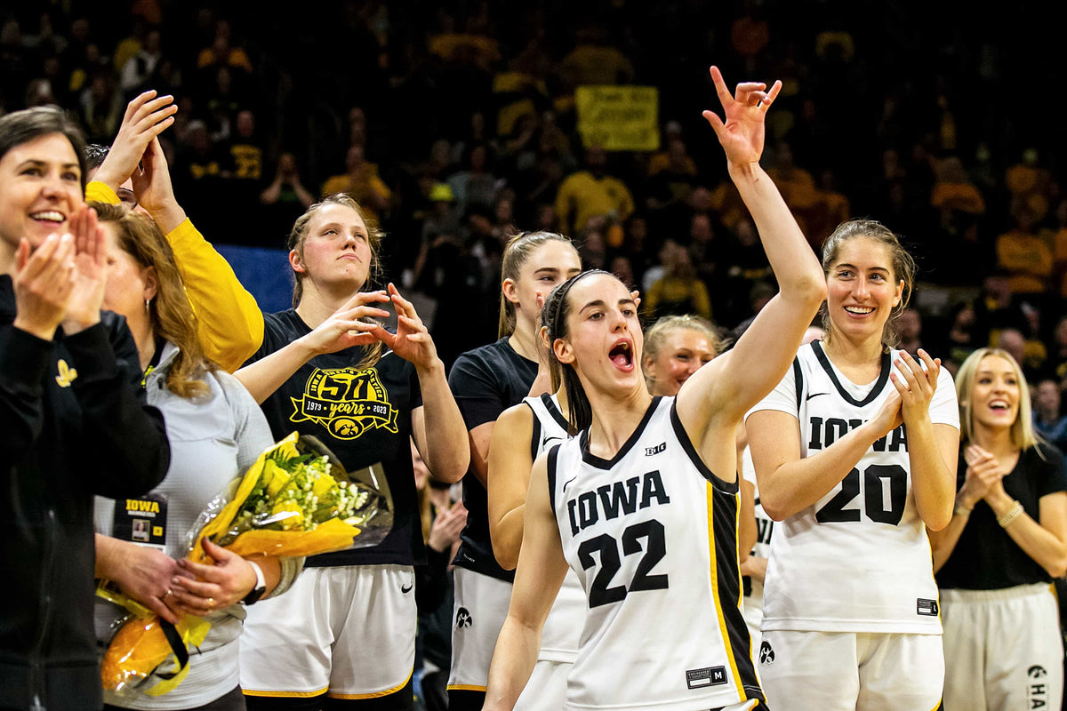 Iowa guard Caitlin Clark (22) cheers on seniors as they are acknowledged after an NCAA Big Ten Conference women's basketball game against Indiana, Feb. 26, 2023. Joseph Cress / Des Moines Register