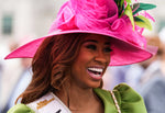 Miss District of Columbia Alivia Roberts laughs while greeting guests outside the paddock of the Kentucky Derby on Saturday at Churchill Downs in Louisville, May, 6, 2023. Matt Stone / The Courier Journal