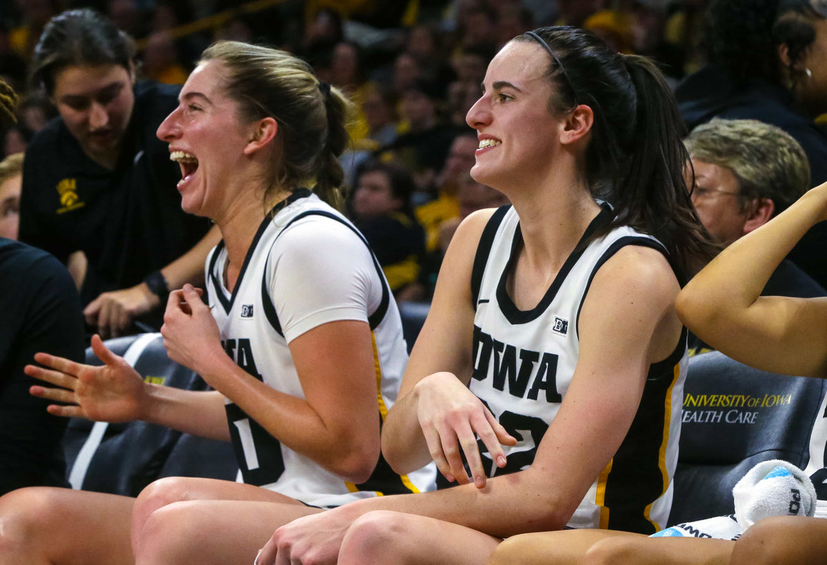 Iowa‘s Kate Martin (20) and Caitlin Clark (22) react during a game against Indiana on Jan. 13, 2024, at Carver-Hawkeye Arena in Iowa City, Iowa. Julia Hansen / Des Moines Register