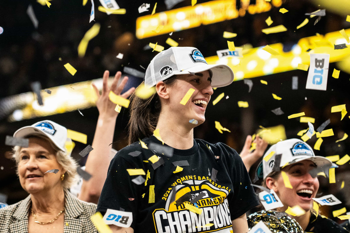 Iowa guard Caitlin Clark (22) reacts as confetti falls after Iowa wins the Big Ten Tournament championship game at the Target Center on March 10, 2024, in Minneapolis, Minn. Lily Smith / Des Moines Register