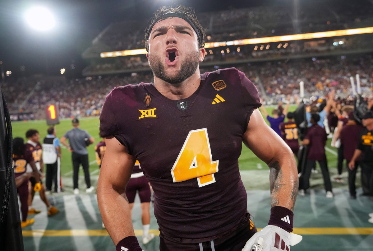 Cam Skattebo shows his passion for victory soon after the Sun Devils scored with 16 seconds left. Skattebo rushed for 182 yards and a touchdown on 25 carries. On the game-winning drive, right after the two-minute timeout, he bolted 39 yards from the ASU 34 to the KU 27.  Joe Rondone / The Republic