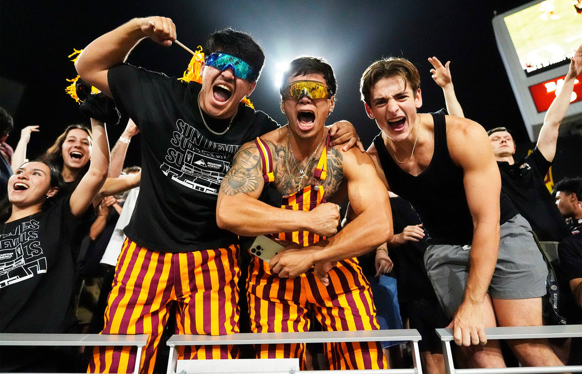 Fans celebrate after the Arizona State Sun Devils upset the Utah Utes 27-19 at Mountain America Stadium.  Rob Schumacher / The Republic
