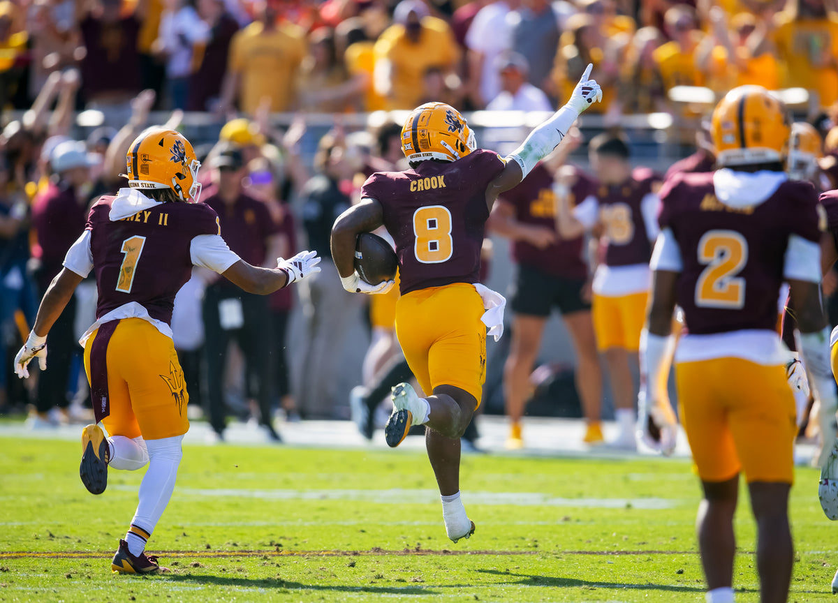 Sun Devils linebacker Jordan Crook celebrates an interception in the first quarter. It ended a BYU drive that reached the ASU 38.  Mark J. Rebilas / Imagn Images