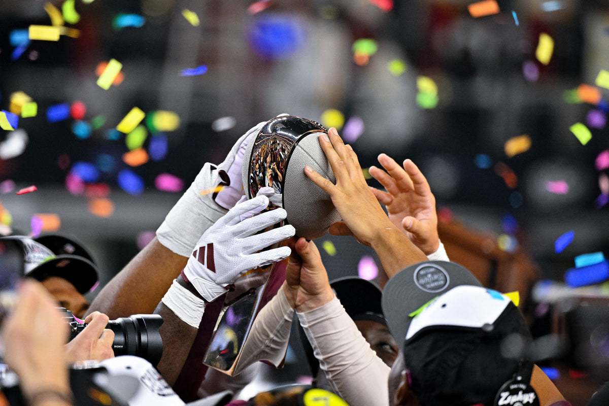 The Sun Devils raise the trophy after they rolled past Iowa State to win the Big 12 championship game at AT&T Stadium in Arlington, Texas. Arizona State won the title in its first year in the conference; the Cyclones have never won the title since the conference formed in 1996.  Jerome Miron / Imagn Images