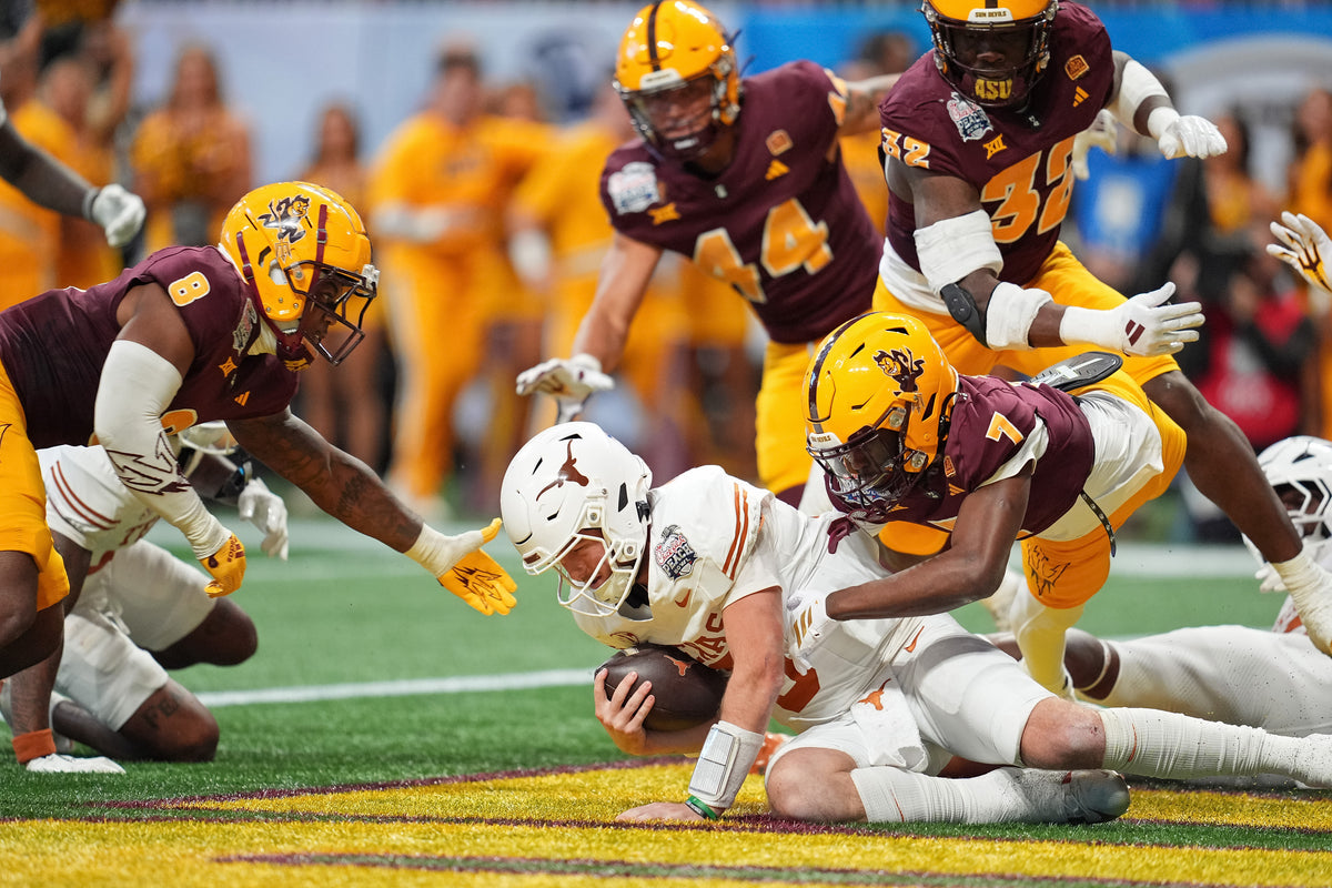 Longhorns quarterback Quinn Ewers recovers a fumble by Quintrevion Wisner in the end zone, and Arizona State’s Shamari Simmons pounces on him for a third-quarter safety.  Dale Zanine / Imagn Images
