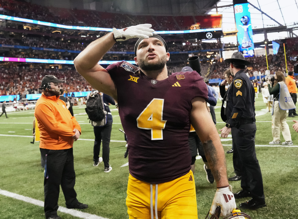 Cam Skattebo blows a kiss to fans after Arizona State fell just short against Texas in double overtime at the Peach Bowl in Atlanta. The Sun Devils’ unexpectedly remarkable season ended at 11-3.  Michael Chow / The Republic