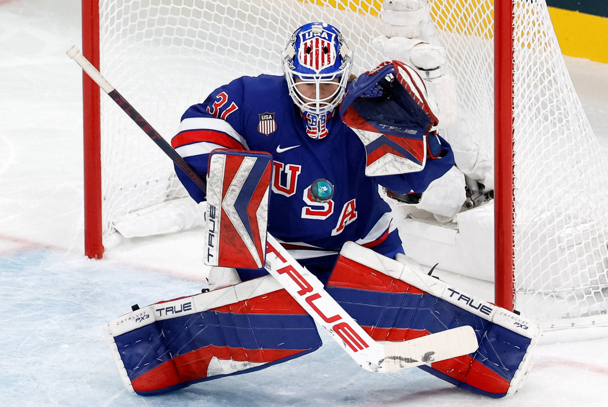 Aerin Frankel (31) of the United States makes a save against Finland in women's ice hockey group A play during the Milano Cortina 2026 Olympic Winter Games at Milano Rho Ice Hockey Arena. David W Cerny / Reuters via Imagn Images