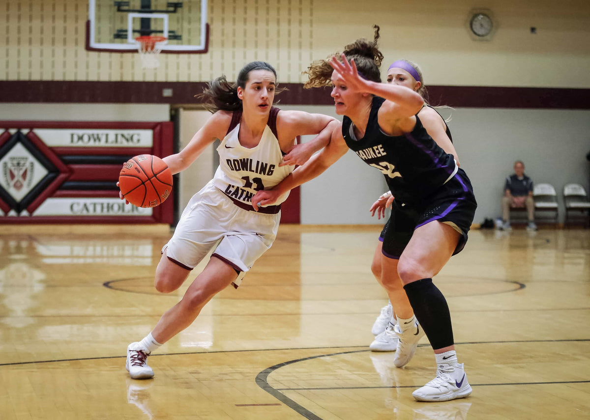 Dowling Catholic senior Caitlin Clark drives to the basket against Waukee on Jan. 21, 2020, at Dowling Catholic High School in West Des Moines. Bryon Houlgrave / Des Moines Register